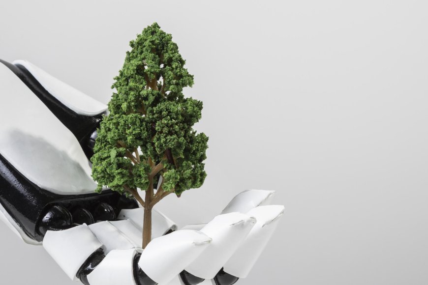 Mano robotica che sostiene un albero